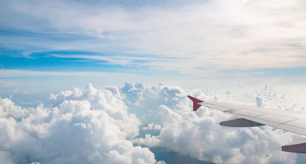 Can You Fly With A Blood Clot? View from plane window of the sky