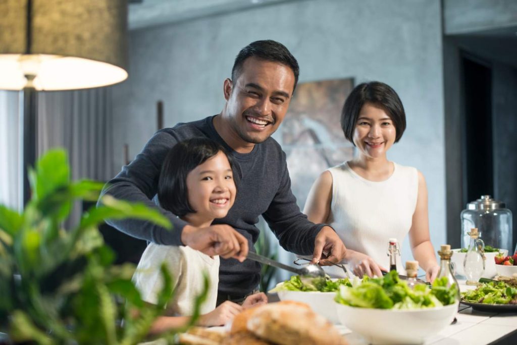 Organic September: Asian family cooking dinner together