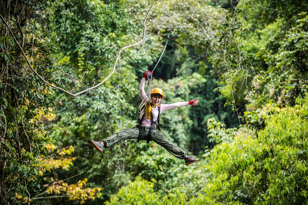 Top 10 safest countries to visit in the world 2018: Zip wiring in Costa Rica tropical jungle 